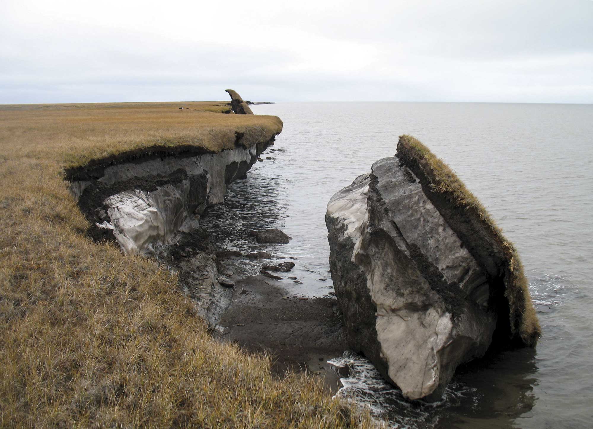 In this photo you can see a collapsed block of ice-rich permafrost along Drew Point, Alaska. Coastal bluffs in this region can erode 20 meters/year (~65 feet). USGS scientists continually research the causes of major permafrost thaw and bluff retreat along the Arctic coast of Alaska.