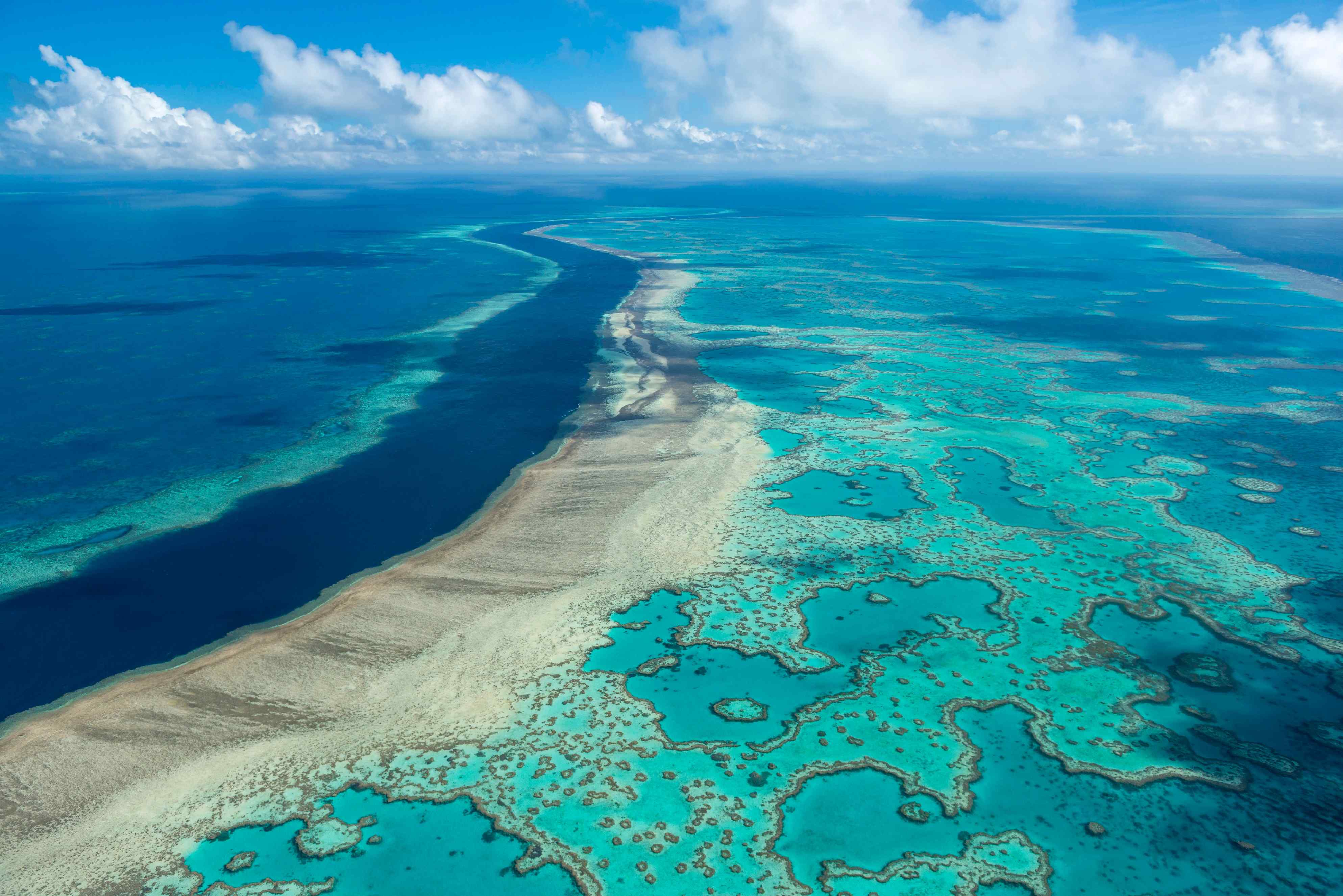 In this photo provided by the Great Barrier Reef Marine Park Authority the Hardy Reef is viewed from the air near the Whitsunday Islands, Australia