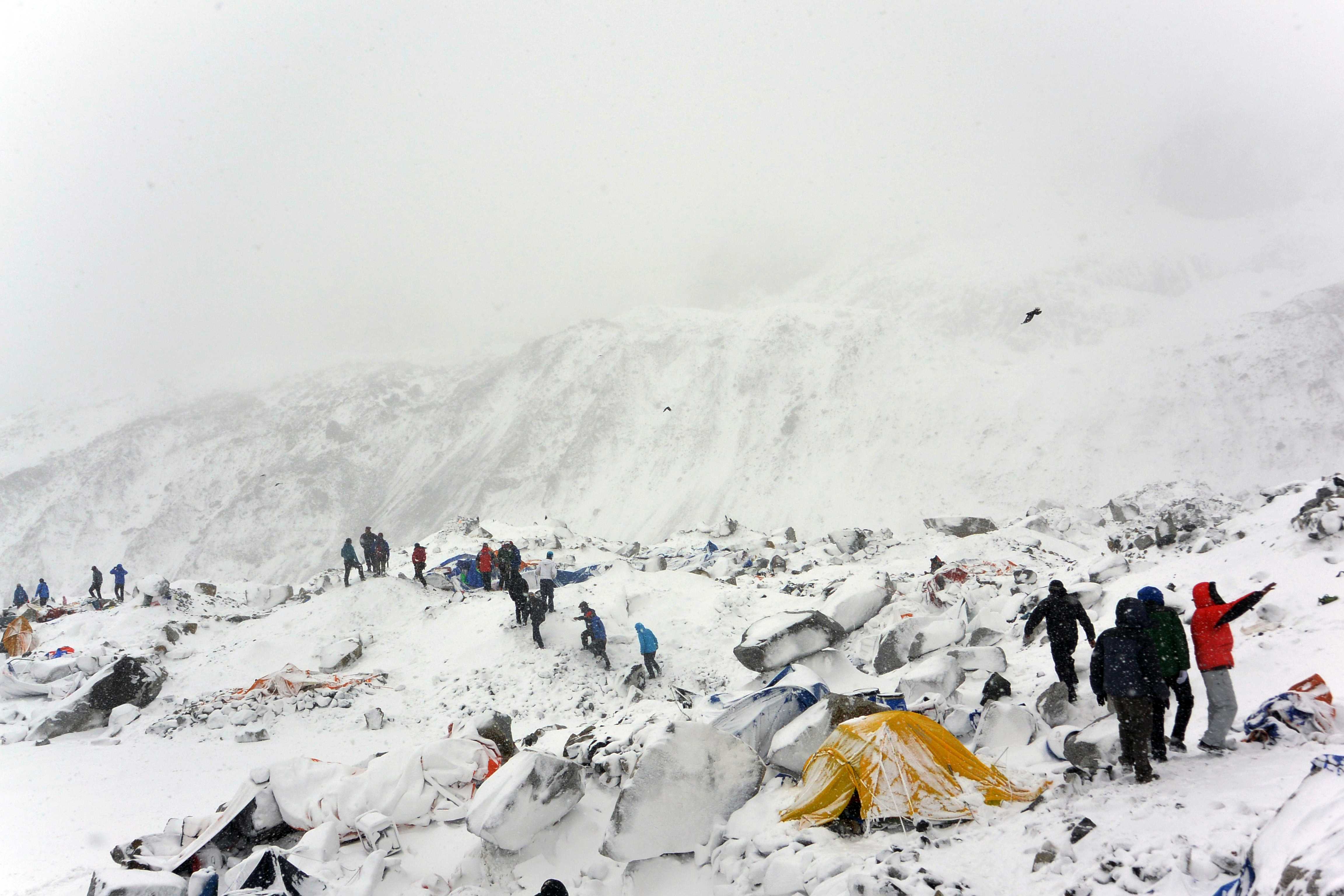 On April 25, 2015, climbers searched for fellow climbers caught in an avalanche at the base camp on the Nepal side of Mount Everest.