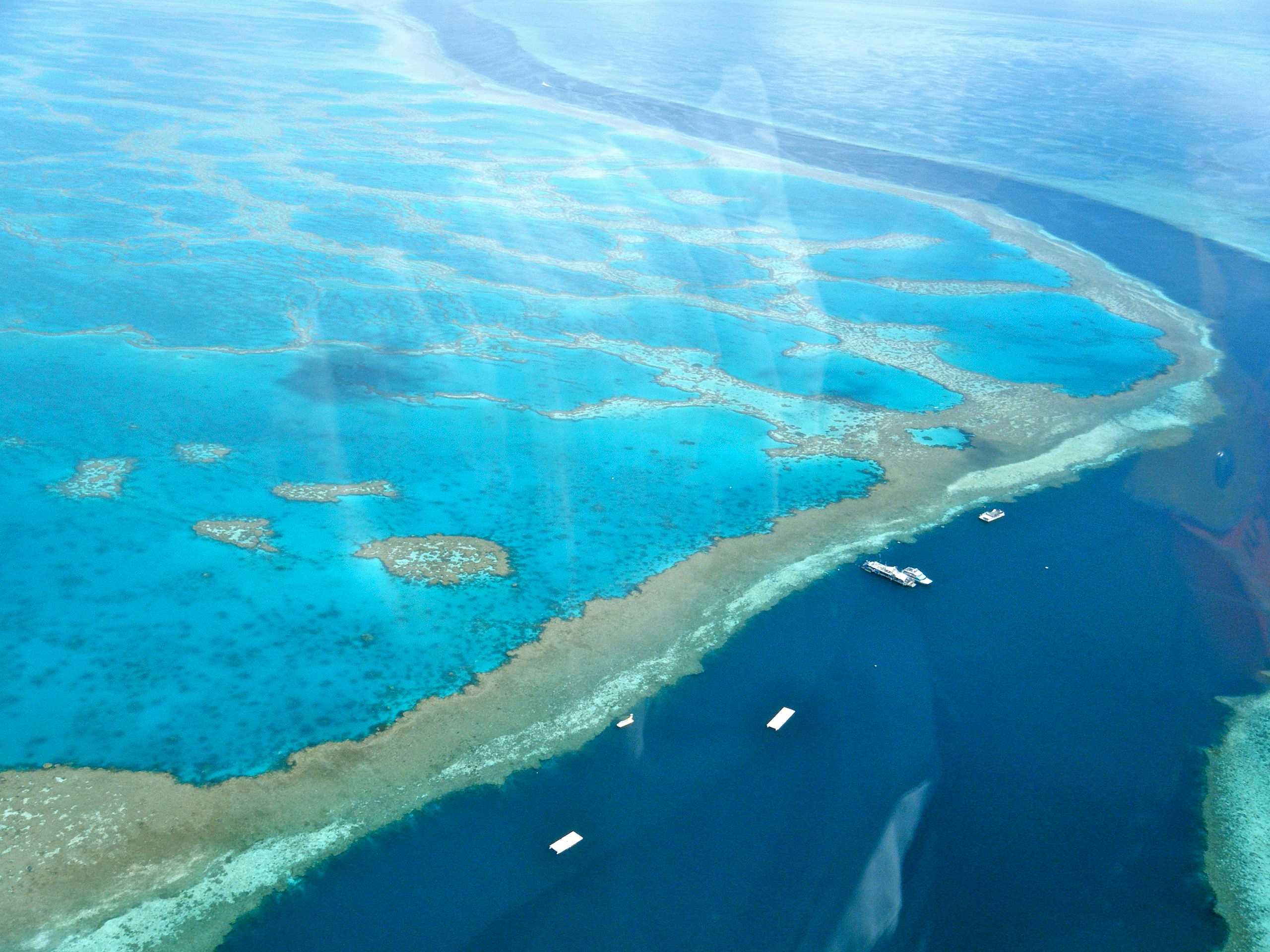 Helicopter ride over the Great Barrier Reef at the Whitsunday Islands, Australia.